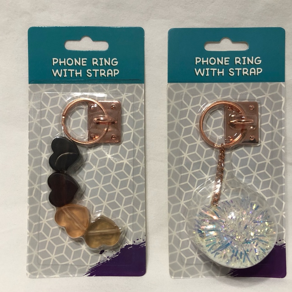 2 Pack phone rings with hearts and pom Pom charms . White/ brown